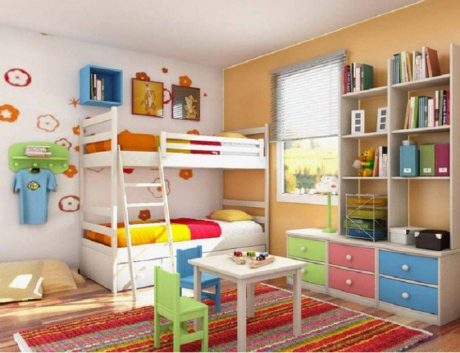 Không gian của bé với ngăn kéo tủ, giường ngủ, và thảm đều là những bảng màu khác nhau vô cùng đáng yêu
